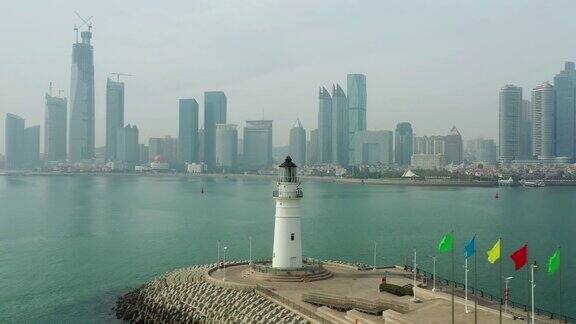 白天青岛城湾建设著名灯塔码头航拍全景4k中国