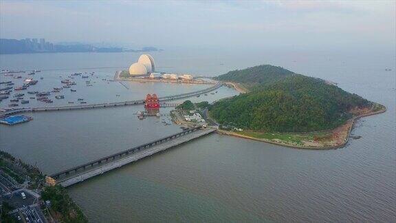 日落珠海市著名的海滩湾歌剧院岛公园航拍全景4k中国