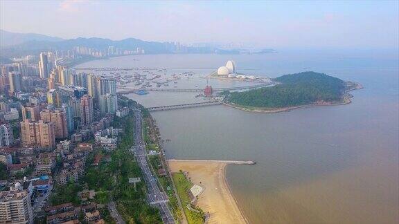 晴天珠海市著名的海滩湾歌剧院岛航拍全景4k中国