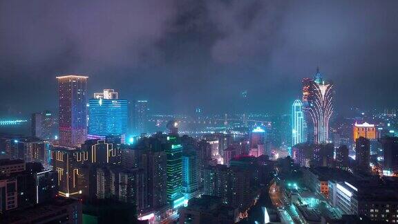 夜间照明飞行飞越澳门城著名酒店区湾航拍4k中国全景