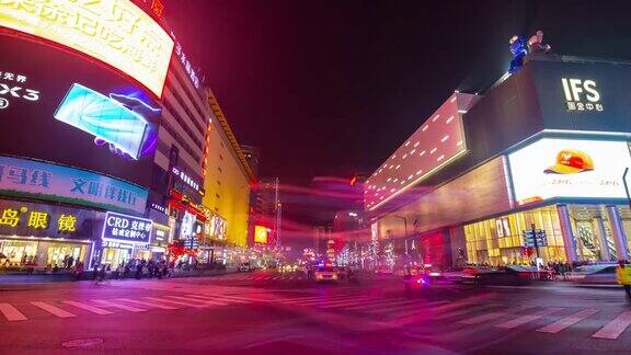 长沙市市中心夜晚灯光照亮著名的交通街道十字路口全景时间跨度4k中国