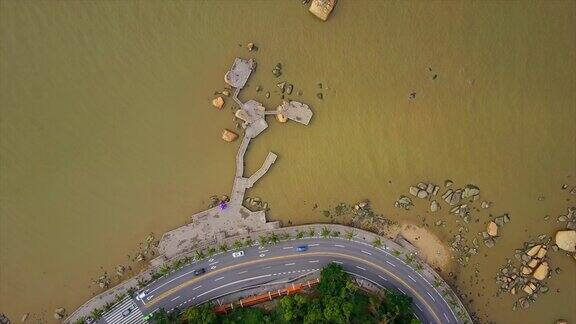 白天珠海市著名的渔女纪念碑湾航拍俯视图4k中国