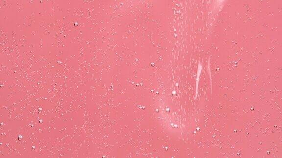透明粉色化妆品精华液凝胶彩妆美容霜质地气泡