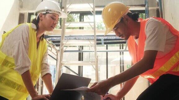 工程师和建筑师在建筑工地工作