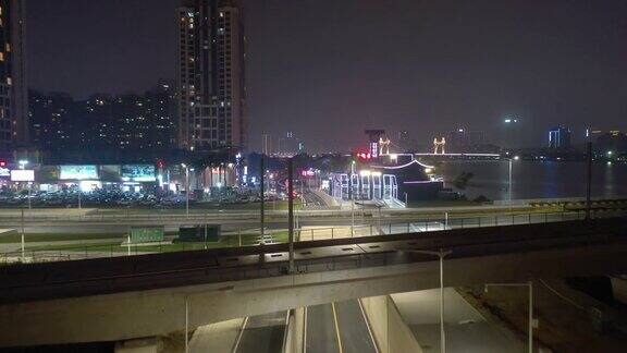 夜晚灯火通明珠海市江滨湾交通街道航拍4k中国全景图