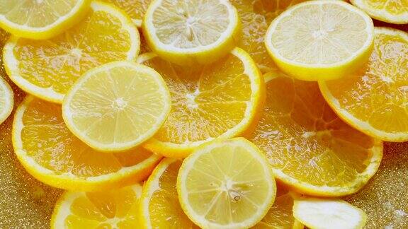 新鲜柠檬和橙子特写旋转