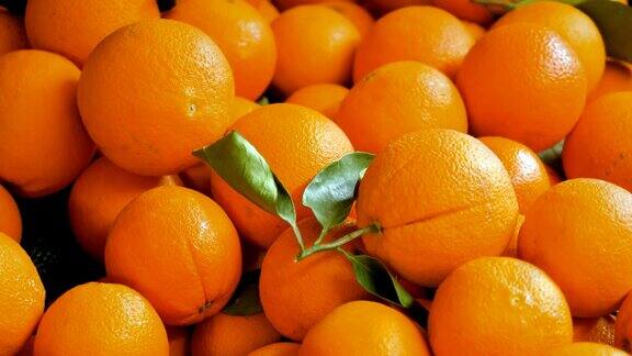柑橘类水果新鲜成熟的橙子在食品市场的特写镜头4k