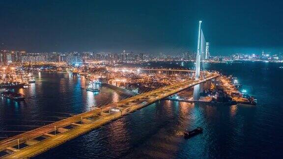 4K延时或超延时:鸟瞰香港城市景观和码头商业港口的夜间商务物流进出口航运或运输