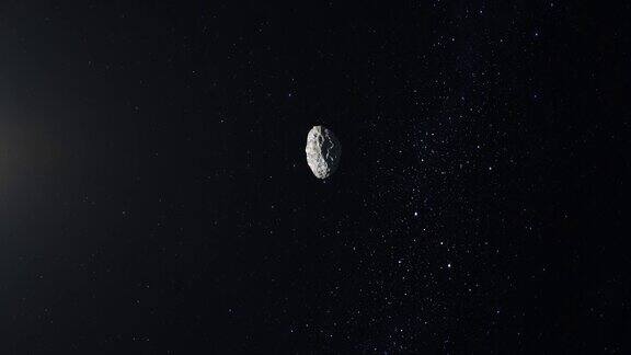 小行星在太空中飞行和旋转小行星出现在屏幕上并迅速飞走星空4k星星闪烁3d渲染