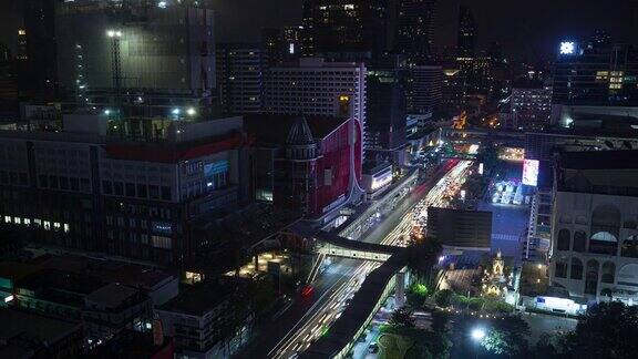 曼谷城市景观夜间照明交通街道著名商场屋顶全景4k延时泰国