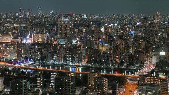 东京城市景观的时间流逝与各种建筑摩天大楼在夜间日本