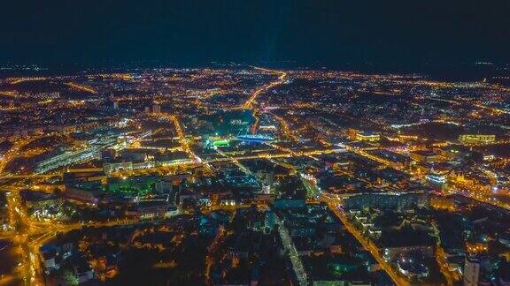 飞越明斯克城市中心夜间照明空中全景图