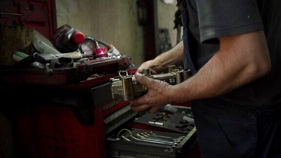 在汽车修理厂从事汽车发动机方面的工作