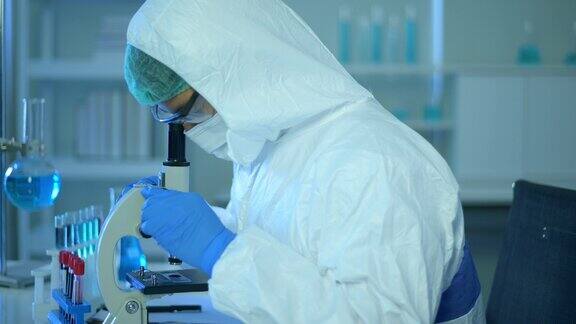 科学家在实验室使用显微镜进行实验科技保健理念