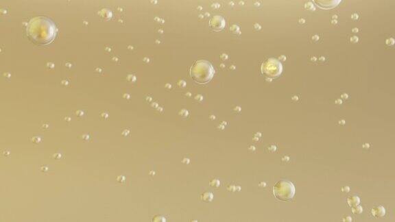微距拍摄的各种黄金气泡在水中上升的光背景