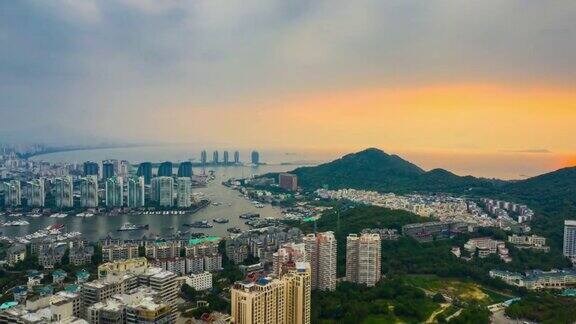 日落时间著名的三亚湾城市景观航拍全景时间间隔4k中国