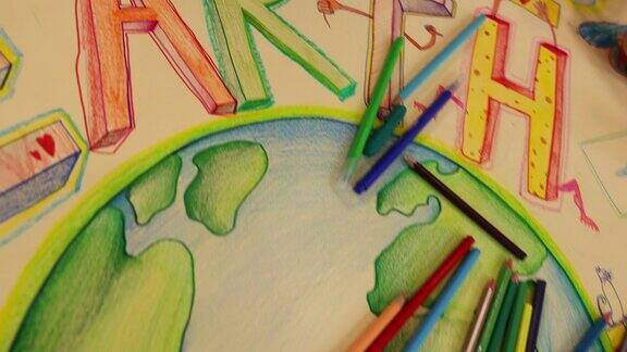 富有创造力的孩子们在地球上画画和上色以提高可持续发展的重要性