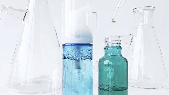 皮肤精华保湿美白精华果酸玻璃体积烧瓶实验室烧瓶用于实验室工作的背景
