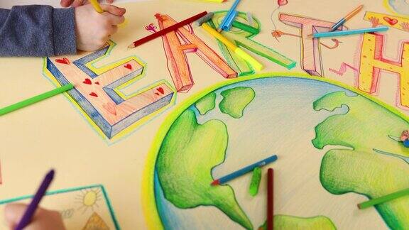 为了提高可持续发展的重要性孩子们在地球上画画和上色