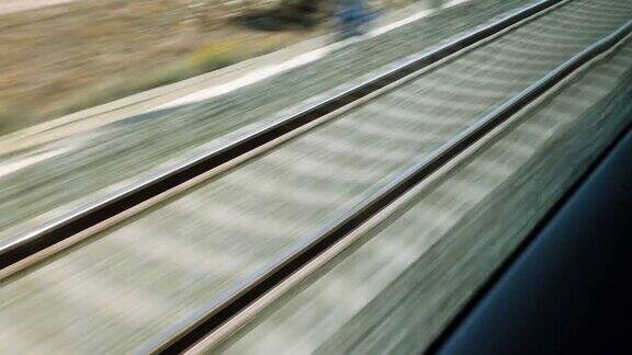 从高速列车的窗口看铁轨子弹头列车在铁路轨道上行驶4k