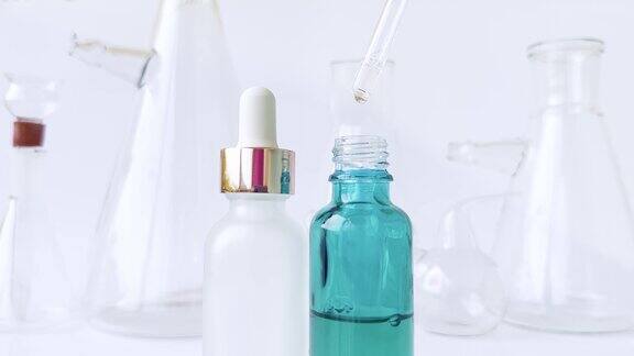 皮肤精华保湿美白精华果酸玻璃体积烧瓶实验室烧瓶用于实验室工作的背景