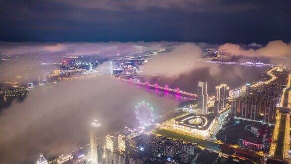 航拍现代城市夜景云和雾上海中国