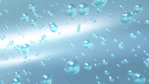 微距拍摄的各种气泡在水中上升在浅蓝色的背景