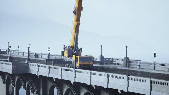 正在施工的桥梁上的大型汽车起重机