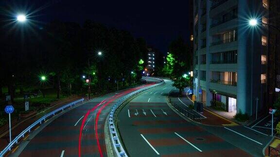 青山广角拍摄的城市街道交通堵塞的夜间时间推移