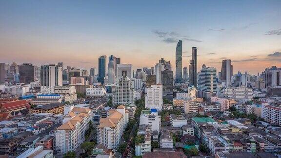 白天到晚上的时间流逝鸟瞰图曼谷市中心在泰国日落时间