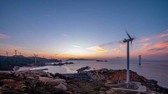日出日落海上风力发电海岛风力发电