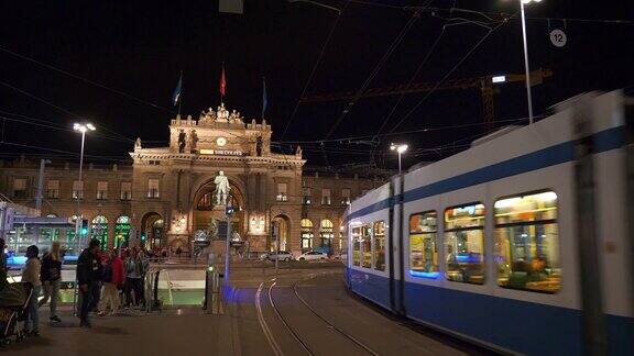 夜间时间苏黎世城著名的火车站、交通、街道广场全景4k瑞士