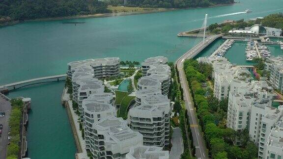 白天新加坡圣淘沙岛地区公寓住宅湾航拍全景4k
