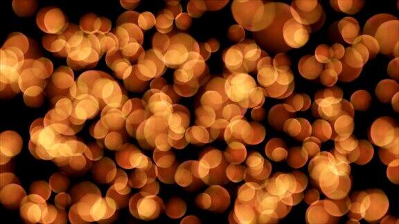 抽象模糊与闪烁散kesh明亮的派对灯抽象的闪光散焦抽象背景橘色灯光散景效果