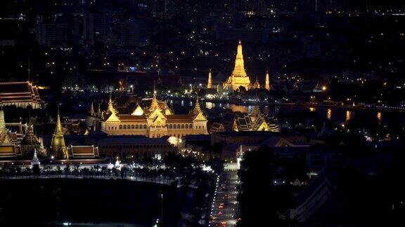 大皇宫黎明寺和卧佛寺在曼谷市的夜晚泰国4K城市景观VDO