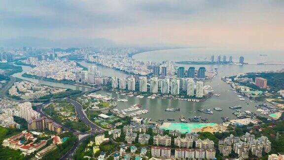 日落时间著名的三亚湾城市景观航拍全景时间间隔4k中国