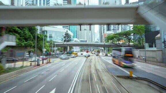 4K分辨率的时间推移在Honhkonh市有轨电车快速运动香港的商业和运输概念
