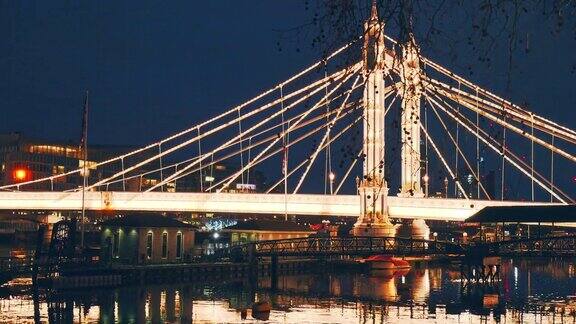 英国伦敦巴特西阿尔伯特桥的美丽夜景4K像素