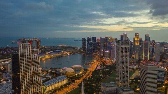 日落时间照明新加坡城市滨海湾市中心空中全景4k时间间隔