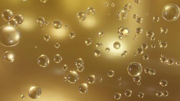 在黄金背景上许多黄金泡沫在水中上升的微距镜头