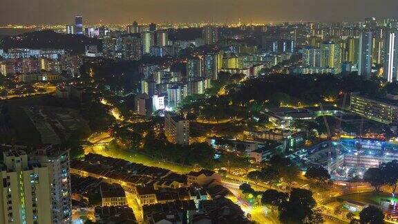 夜晚照亮新加坡城市景观屋顶全景4k时间流逝