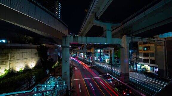 一个夜晚的时间流逝在池尾桥城市街道上的交通宽镜头