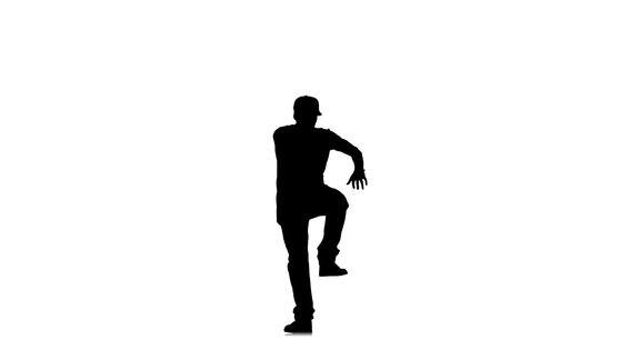 时尚和运动的男子跳舞嘻哈kramp在白色背景慢动作剪影