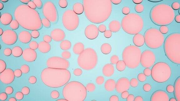 不同大小的粉红色气泡绕圈移动
