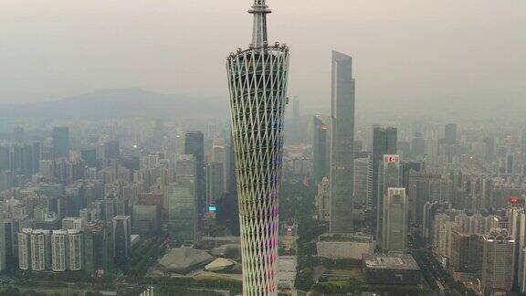 日落时分照明广州市市中心著名的塔顶航拍全景4k中国