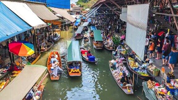 4K时间流逝游客在泰国DamnoenSaduak水上市场