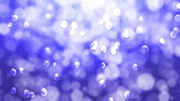 带有蓝色粒子背景的雨滴可循环