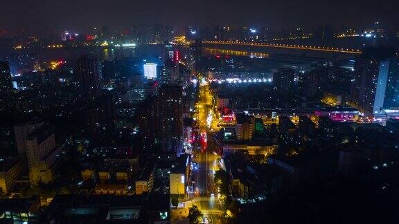 中国夜景时间照亮武汉城市景观交通街道沿江航拍全景4k时间流逝