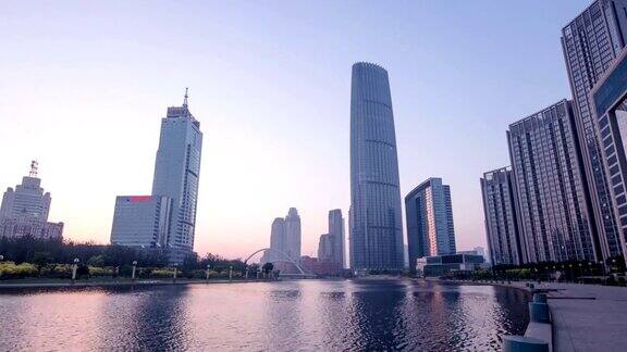 日出时分天津河边的和现代建筑