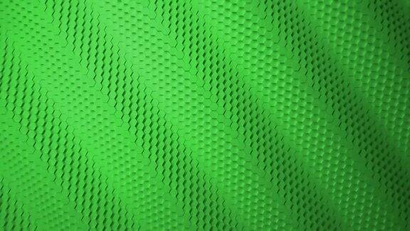 绿色的极简主义波动带有移动六边形的马赛克表面抽象的几何背景细胞动画循环4k3d循环商业演示的动画
